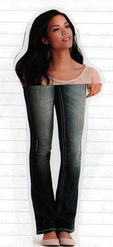 Model posing in jeans with a vertical scratch parallel to the seam of the jeans.