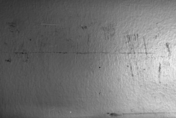 Barnett Newman scratching on the wall in prison.